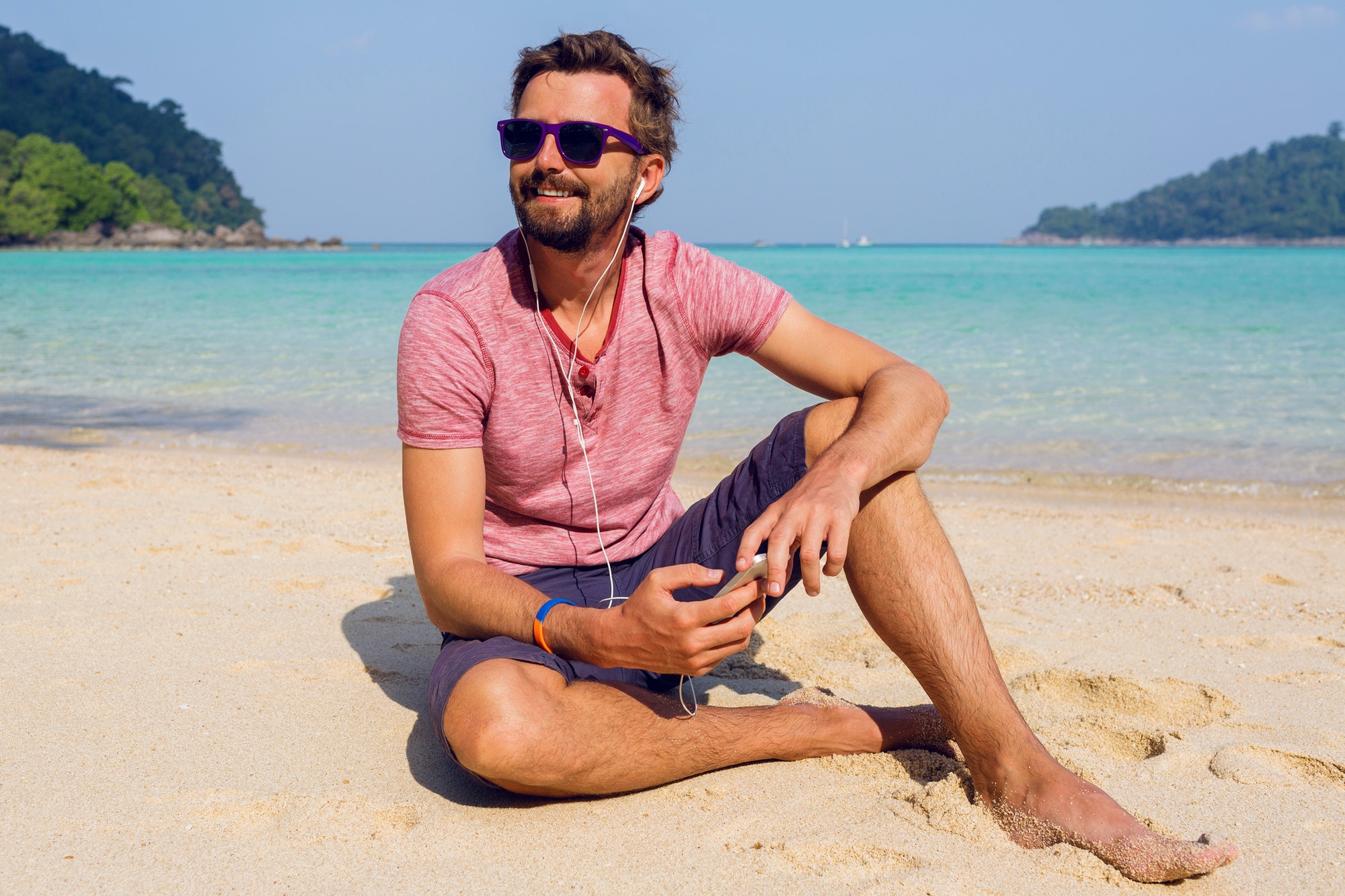 Attractive man man in stylish sunglasses with beard