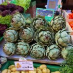 Artichokes and other vegetables in the market.