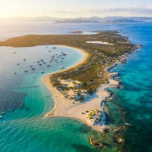 Aerial view over the clear beach and turquoise water of Formentera, Ibiza