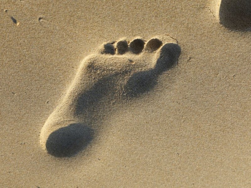 Human footprint of on a Spanish beach